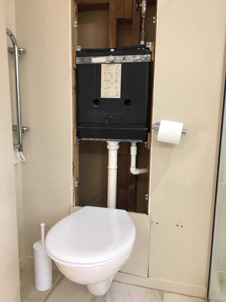 inwall toilet cistern - expensive plumbing maintenance jobs